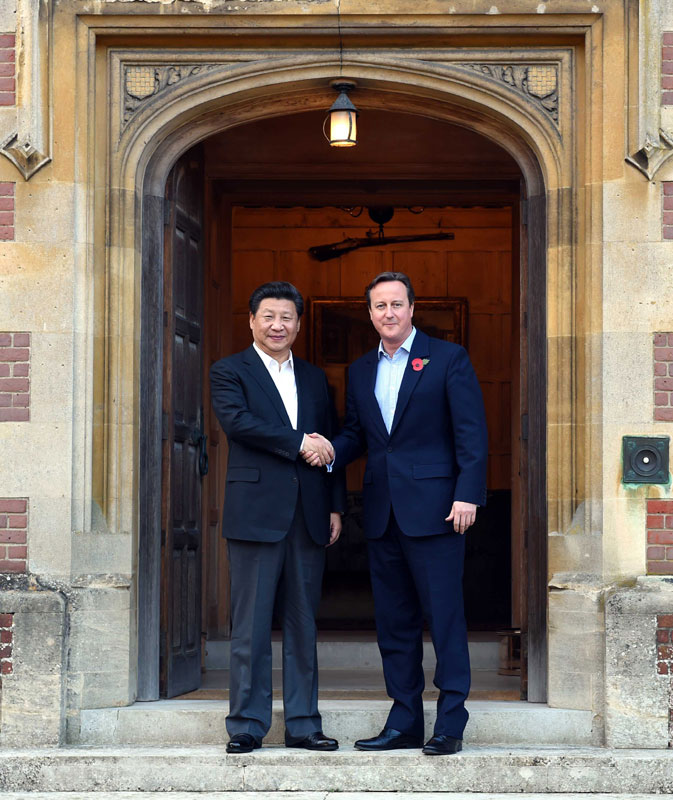 10月22日，國家主席習(xí)近平在契克斯首相鄉(xiāng)間別墅同英國首相卡梅倫再次會(huì)晤。新華社記者 饒愛民 攝
