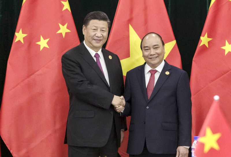 2017年11月11日，中共中央總書記、國家主席習(xí)近平在峴港行政中心會見越南總理阮春福。 新華社記者 費茂華 攝