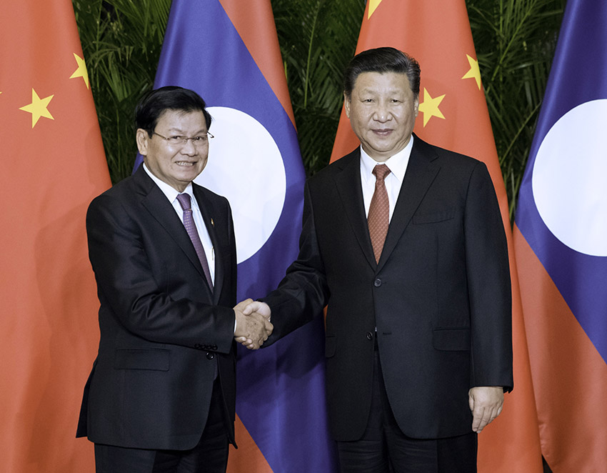 11月4日，國(guó)家主席習(xí)近平在上海會(huì)見老撾總理通倫。 新華社記者 丁海濤 攝