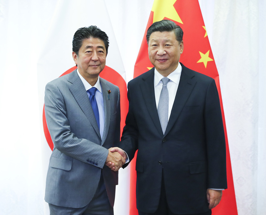 9月12日，國家主席習近平在符拉迪沃斯托克會見日本首相安倍晉三。新華社記者 謝環(huán)馳 攝