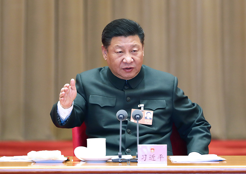 2018年3月12日上午，中共中央總書記、國(guó)家主席、中央軍委主席習(xí)近平出席十三屆全國(guó)人大一次會(huì)議解放軍和武警部隊(duì)代表團(tuán)全體會(huì)議並發(fā)表重要講話。新華社記者 李剛 攝