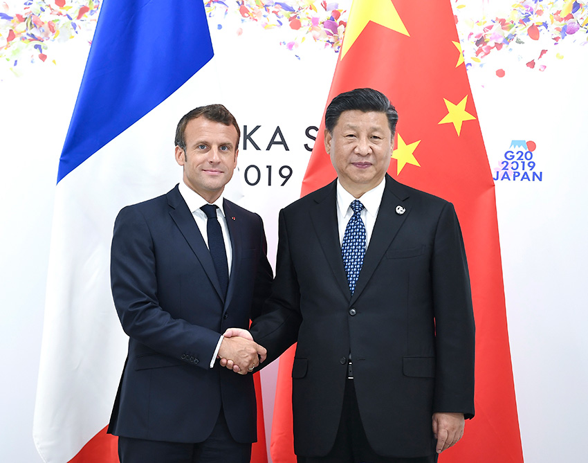6月29日，國家主席習近平在大阪會見法國總統(tǒng)馬克龍。 新華社記者 燕雁 攝